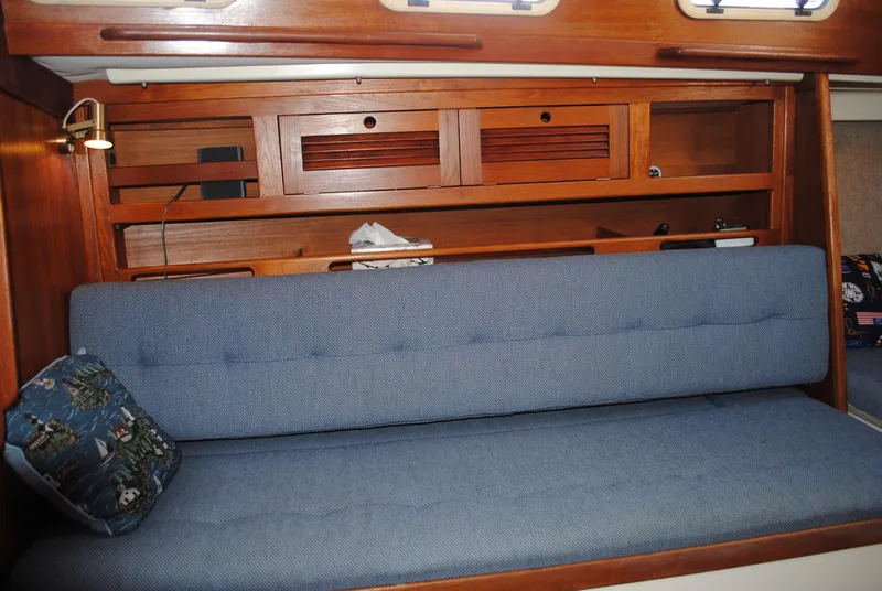 Slide: The Image of Interior of a 1988 Tartan 28 sailboat with wooden finish. - 27