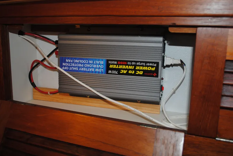 Slide: The Image of Cockpit of 1988 Tartan 28 sailboat with striped cushions and colorful flowers. - 37