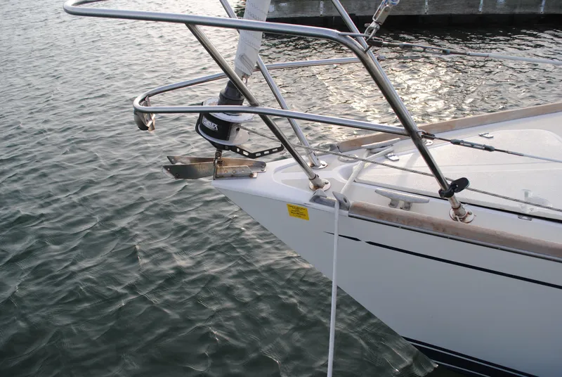 Slide: The Image of Bow of a 1988 Tartan 28 sailboat on the water. - 5