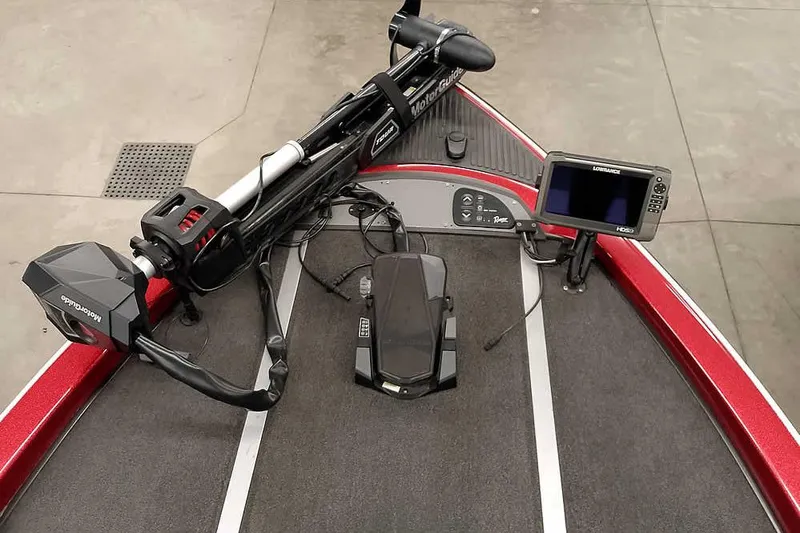 Slide: The Image of 2005 Ranger Z20 Comanche boat deck with trolling motor and fish finder. - 20