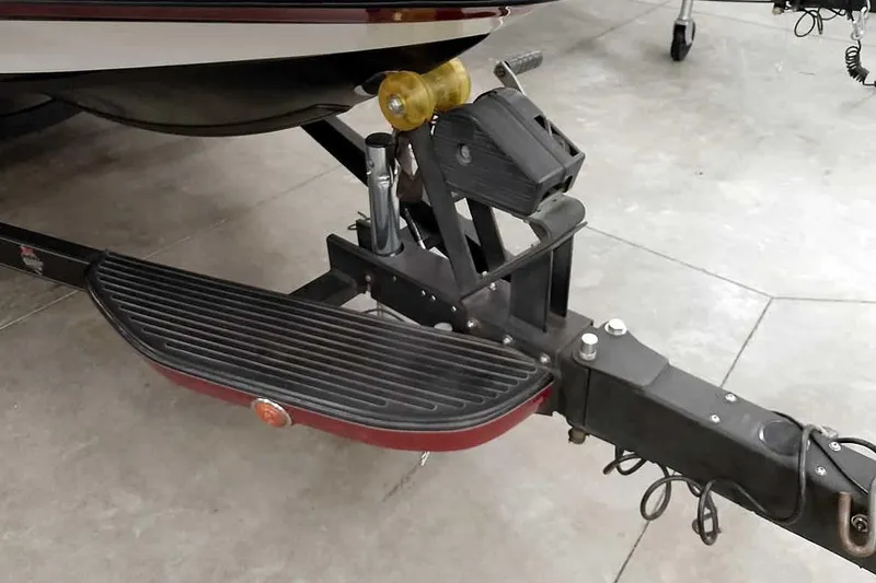 Slide: The Image of Trailer hitch of 2005 Ranger Z20 Comanche boat, featuring step and winch mechanism. - 5
