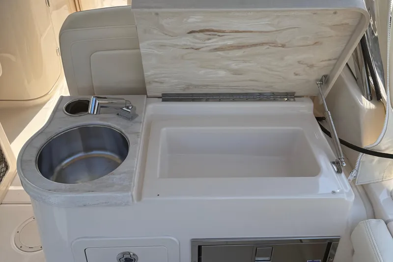 Slide: The Image of 2021 Grady-White Freedom 307 boat sink and countertop detail. - 10