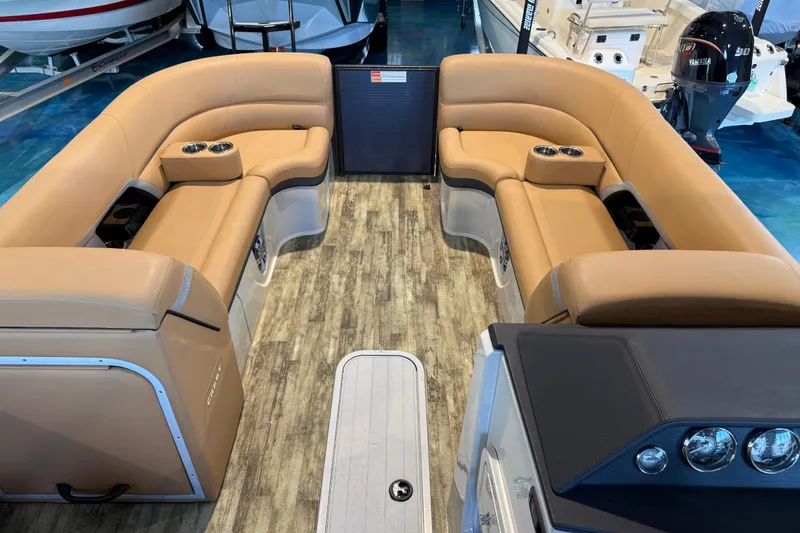 Slide: The Image of Luxurious interior of 2024 Crest Caribbean LX 230 pontoon boat with tan seating. - 17