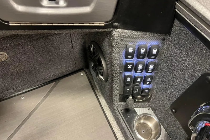 Slide: The Image of Control panel and speaker in 2023 Lund 2175 Pro-V boat interior. - 11