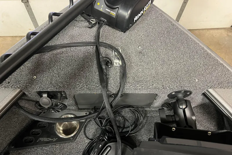 Slide: The Image of 2023 Lund 2175 Pro-V boat interior with Minn Kota trolling motor and wiring. - 21