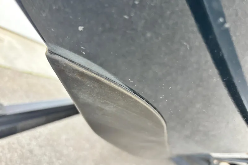 Slide: The Image of Close-up of a 2007 Ranger Z21 Comanche boat hull detail. - 2