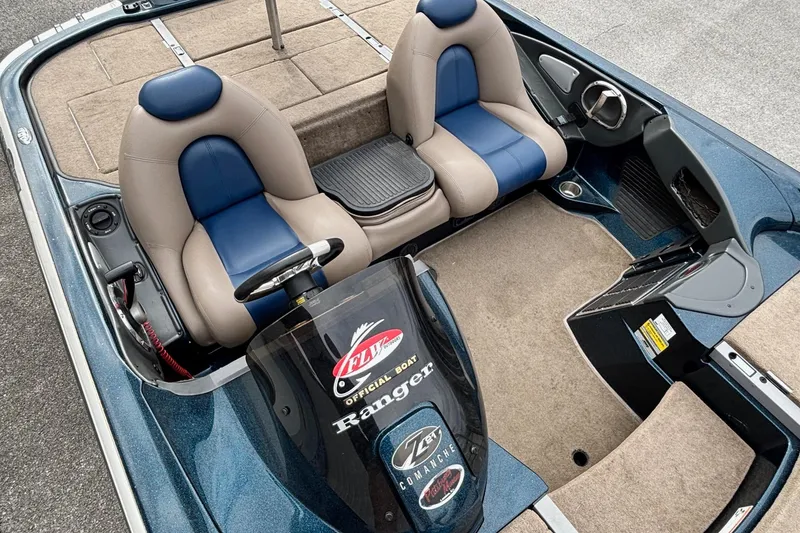 Slide: The Image of 2007 Ranger Z21 Comanche boat interior with dual seats and steering console. - 6