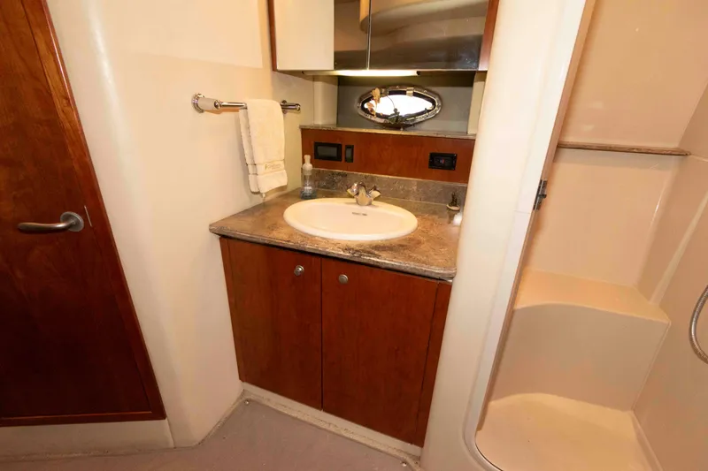 Slide: The Image of Bathroom interior of 2008 Cruisers Yachts 460 Express with sink and shower. - 15
