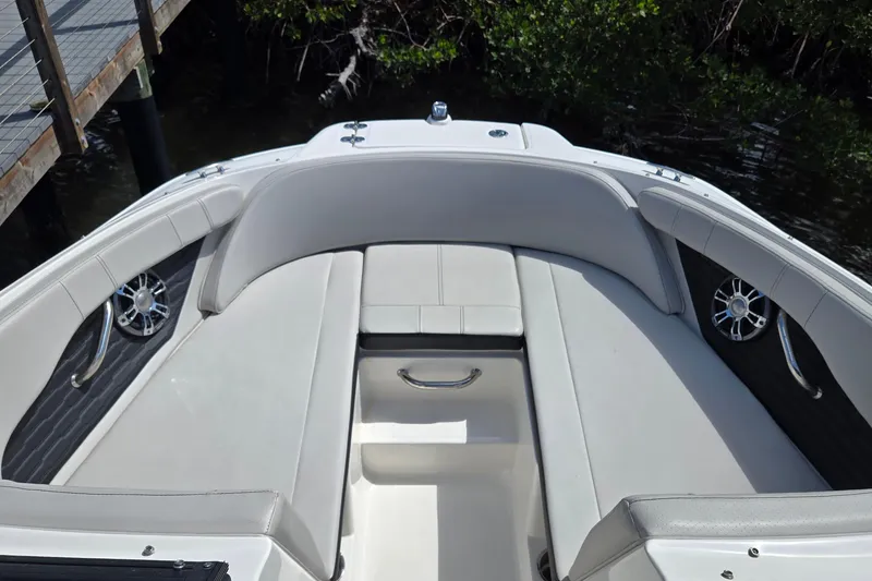 Slide: The Image of 2023 Sea Ray SPX 210 boat interior with sleek seating and modern design. - 15