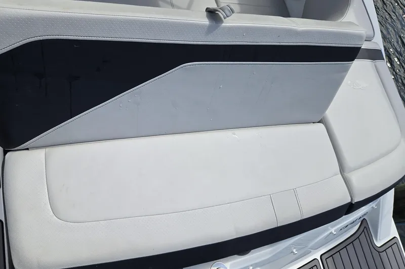 Slide: The Image of 2023 Sea Ray SPX 210 boat seating with sleek, modern upholstery design. - 19