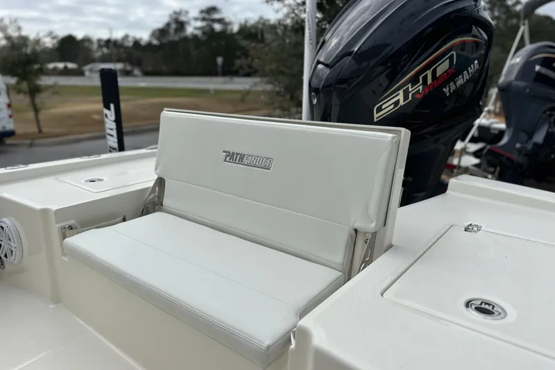 Slide: The Image of 2026 Pathfinder 2200 TRS boat with Yamaha engine, featuring white seating and sleek design. - 11
