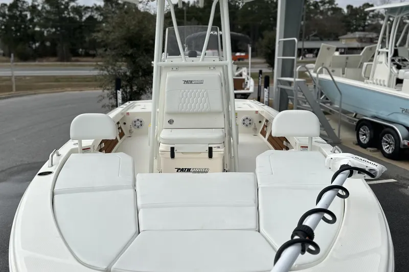 Slide: The Image of 2026 Pathfinder 2200 TRS boat with white seating and Garmin trolling motor. - 25