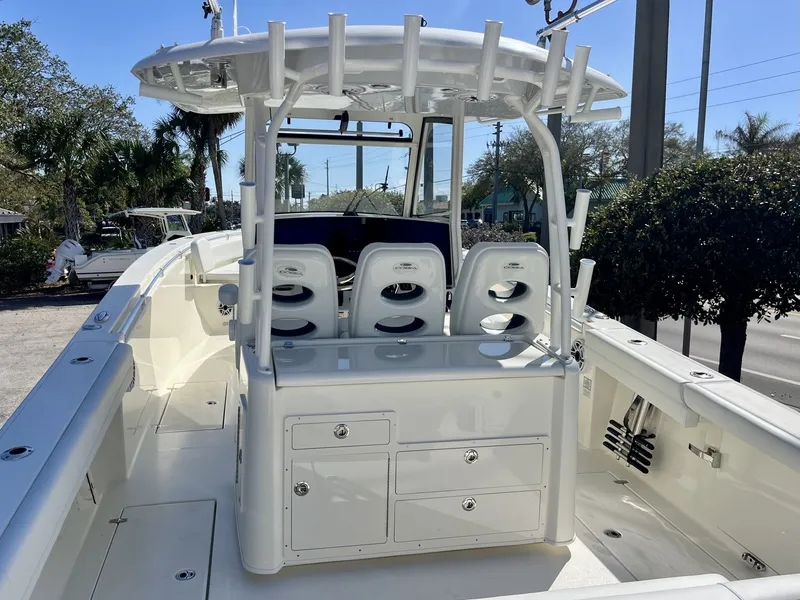 Slide: The Image of 2026 Cobia 350 Center Console with spacious deck and seating area. - 11