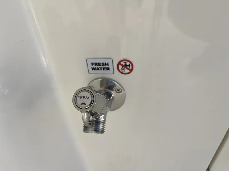 Slide: The Image of Fresh water tap on Cobia 350 Center Console 2026. - 47