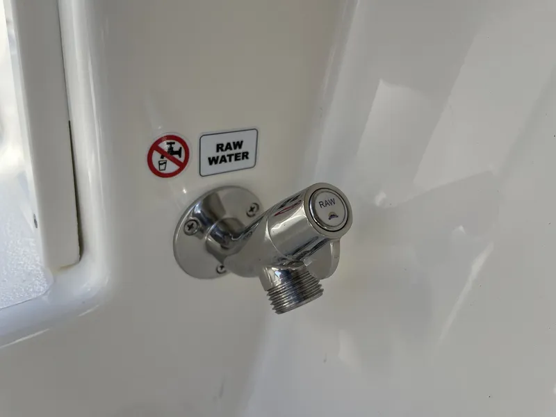 Slide: The Image of Raw water faucet on Cobia 350 Center Console 2026. - 48
