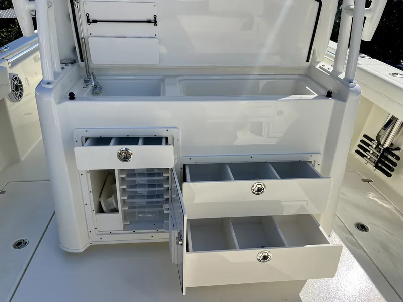 Slide: The Image of Cobia 350 Center Console 2026 with storage compartments and drawers. - 12