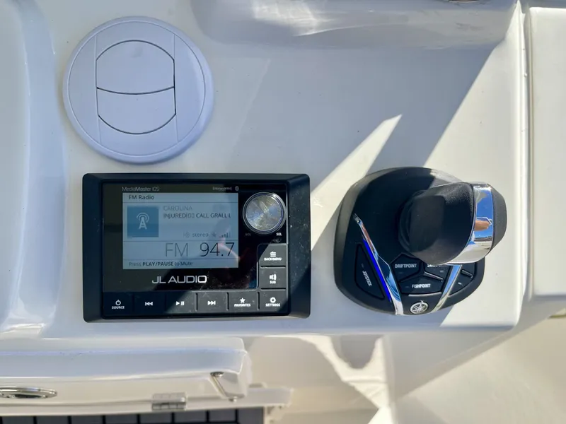 Slide: The Image of JL Audio control on 2026 Cobia 350 Center Console. - 17