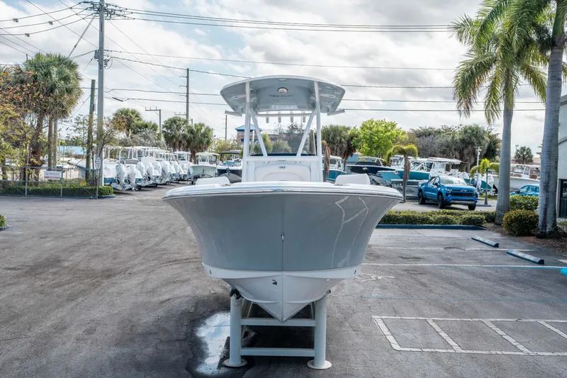 Slide: The Image of Sea Hunt Ultra 234 boat, 2026 model, parked outdoors. - 7
