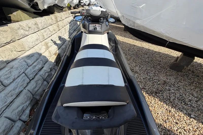 Slide: The Image of 2018 Yamaha WaveRunner FX Cruiser HO with black and white seat, parked on gravel. - 3