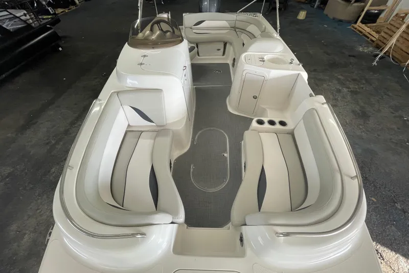 Slide: The Image of 2016 Starcraft Coastal 2009 OB boat interior with spacious seating and modern design. - 19