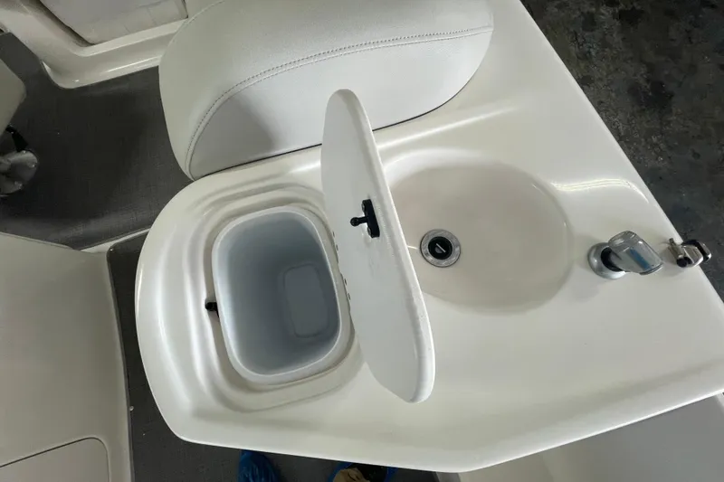 Slide: The Image of Starcraft Coastal 2009 OB boat sink and storage compartment, 2016 model. - 5