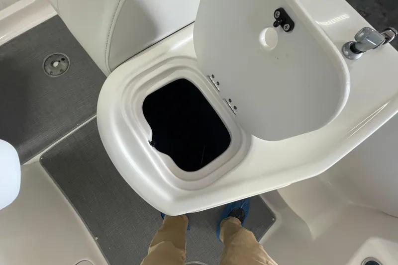 Slide: The Image of Open storage compartment on a 2016 Starcraft Coastal 2009 OB boat. - 6