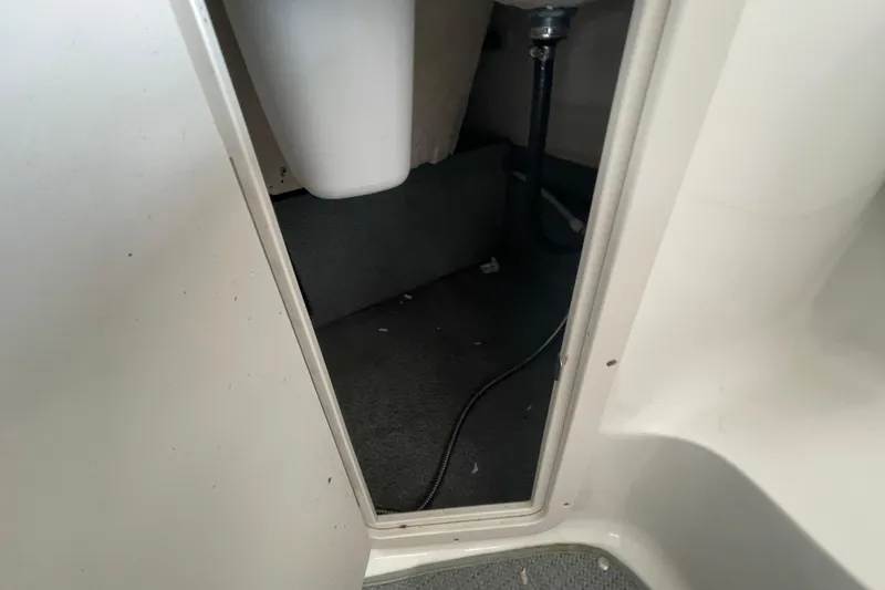 Slide: The Image of Interior view of a 2016 Starcraft Coastal 2009 OB boat compartment. - 7