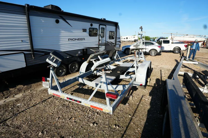 Slide: The Image of Boat trailer near RV and vehicles, Catalina 27 model, 1988. - 25