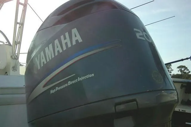 Slide: The Image of Yamaha outboard motor on a 2005 Sea Pro boat, featuring high-pressure direct injection. - 13