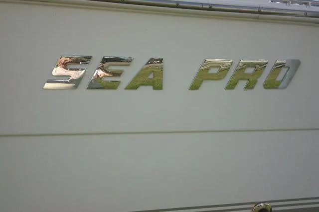 Slide: The Image of 2005 Sea Pro boat logo on white surface. - 20