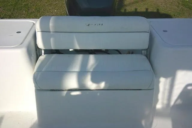 Slide: The Image of 2005 Sea Pro boat seat with white cushions and shadow patterns. - 28