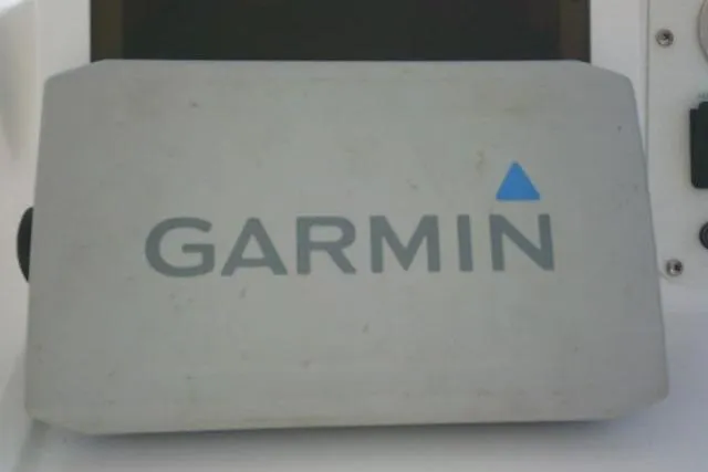 Slide: The Image of Garmin device on 2005 Sea Pro boat dashboard. - 45