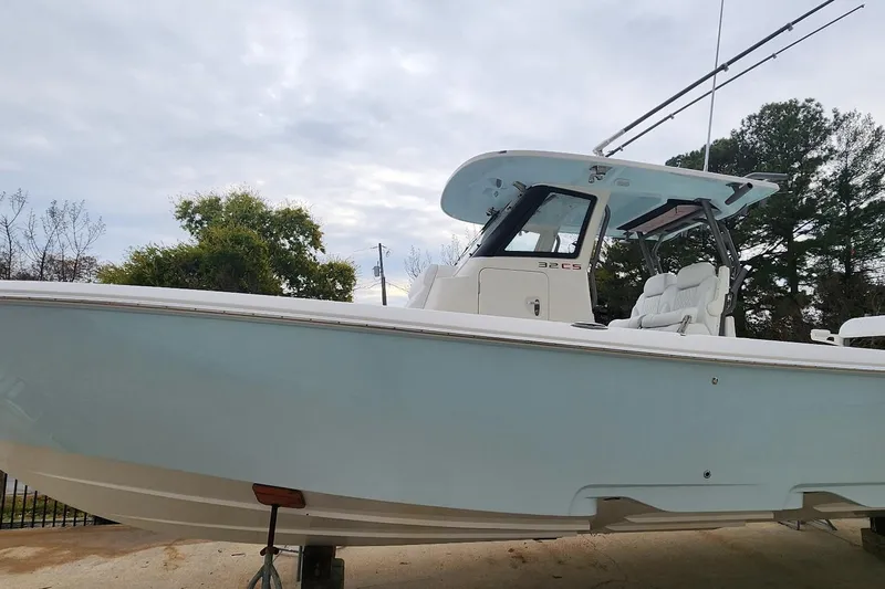 The Image of 2025 Solace 32 CS boat with sleek design and modern features. - 0