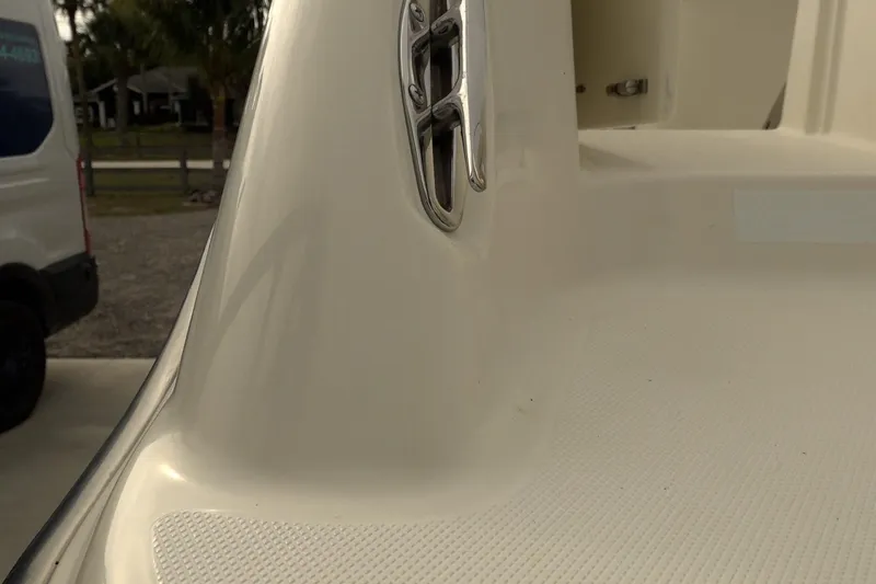 Slide: The Image of 2008 Hydra-Sports Vector 2900 CC boat detail, featuring sleek white surface and chrome accents. - 11