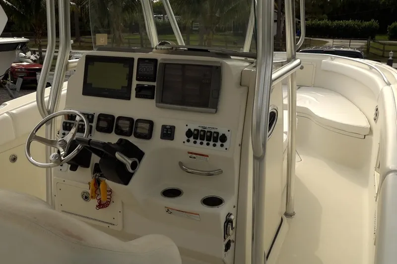 Slide: The Image of 2008 Hydra-Sports Vector 2900 CC boat cockpit with steering wheel and control panel. - 18