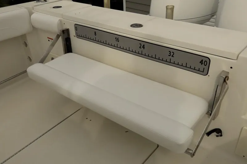 Slide: The Image of 2008 Hydra-Sports Vector 2900 CC boat with foldable white bench seat and measuring scale. - 20