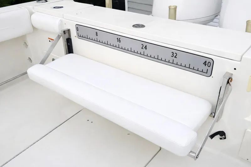 Slide: The Image of 2008 Hydra-Sports Vector 2900 CC boat with foldable white bench seat and measuring scale. - 34