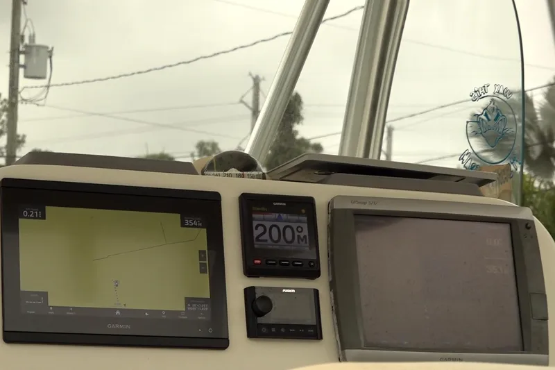 Slide: The Image of Dashboard of 2008 Hydra-Sports Vector 2900 CC with navigation equipment. - 8