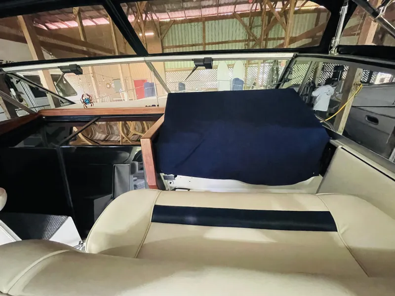 Slide: The Image of Interior of a 1989 Sea Ray 390 Express Cruiser, beige upholstery. - 27