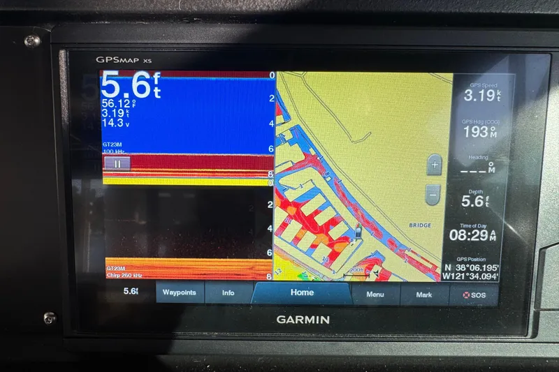 Slide: The Image of Garmin GPS display on 1989 Sea Ray 390 Express Cruiser showing navigation and depth data. - 32