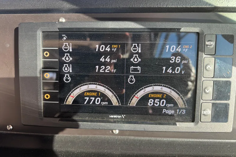 Slide: The Image of Digital dashboard of a 1989 Sea Ray 390 Express Cruiser displaying engine metrics. - 34