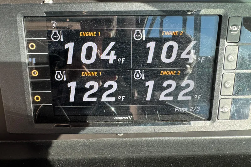 Slide: The Image of Digital display showing engine temperatures on a 1989 Sea Ray 390 Express Cruiser. - 37
