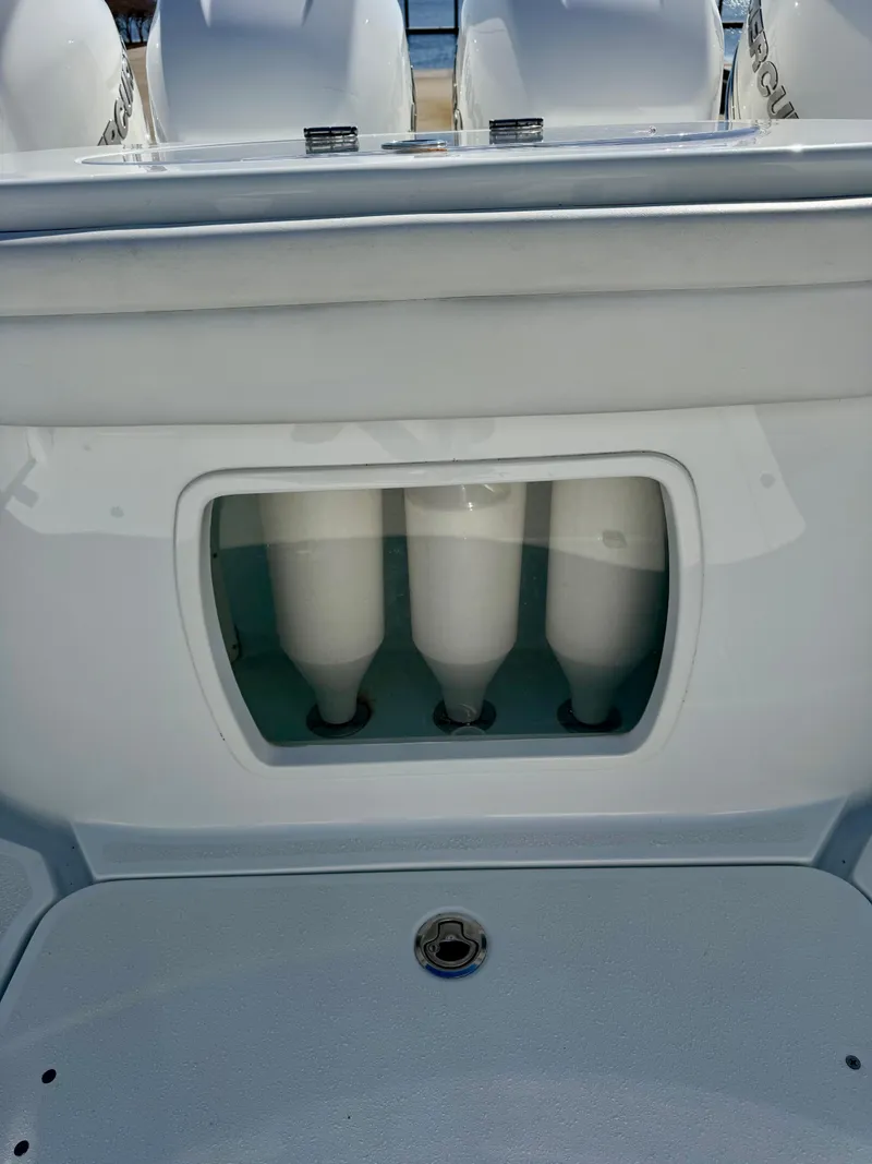 Slide: The Image of 2020 Yellowfin 42 Offshore boat interior with spacious seating and storage compartments. - 22