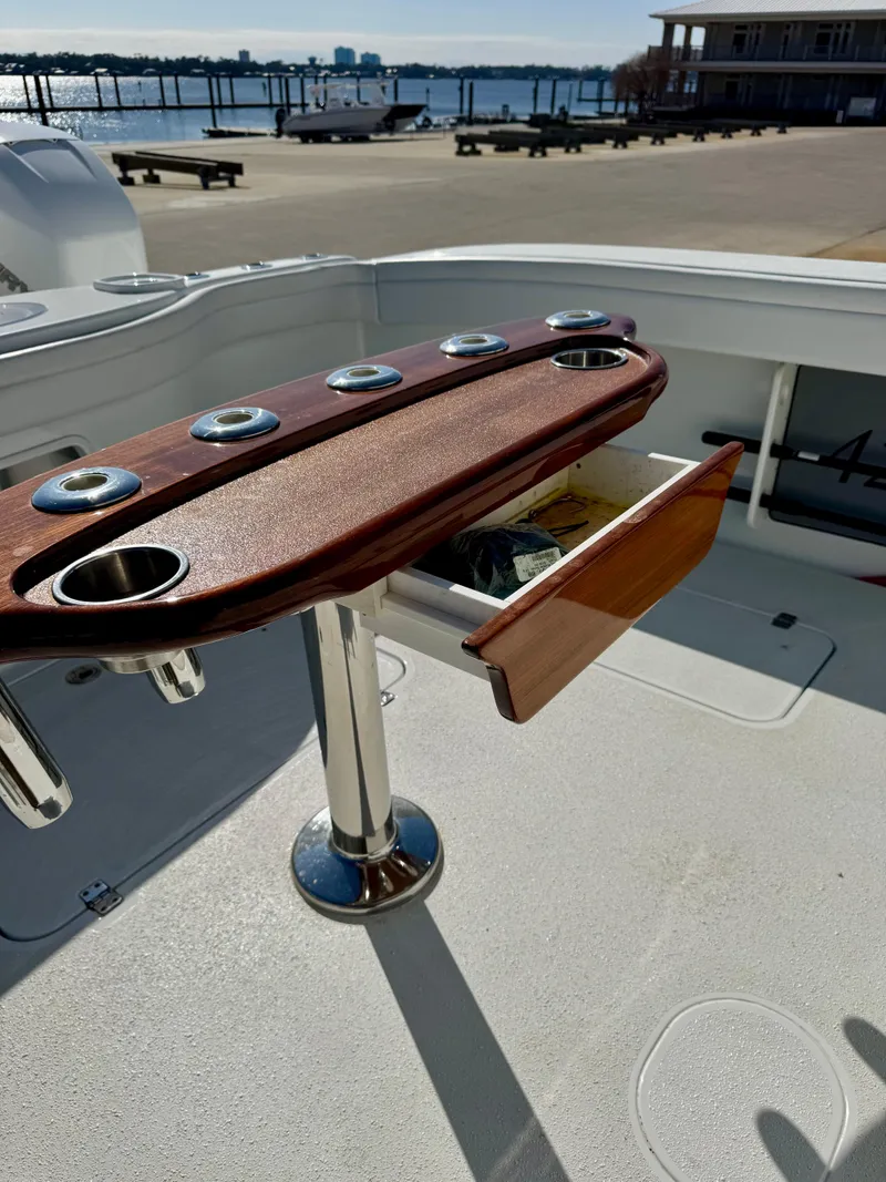 Slide: The Image of 2020 Yellowfin 42 Offshore boat deck with ocean view and clear sky. - 23