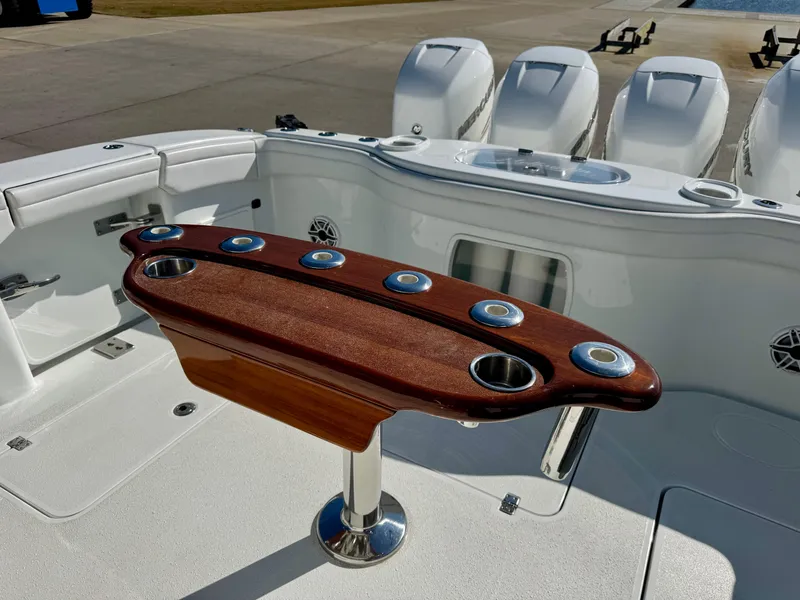 Slide: The Image of 2020 Yellowfin 42 Offshore boat deck with seating and ocean view. - 24