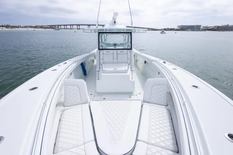 Slide: The Image of 2020 Yellowfin 42 Offshore boat with luxurious seating on calm waters. - 5
