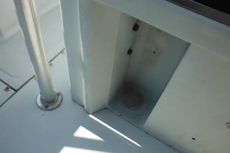 Slide: The Image of Interior view of a 1990 Boston Whaler Guardian 22 boat, showing structural details. - 20