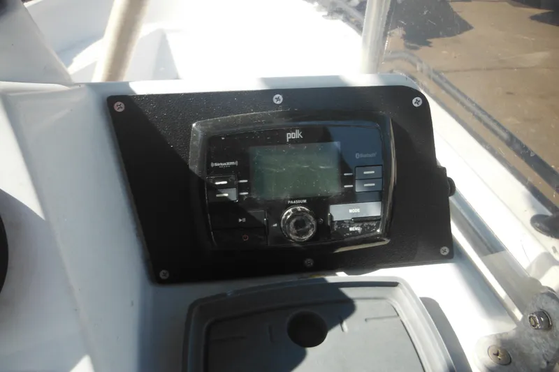Slide: The Image of Control panel of a 1990 Boston Whaler Guardian 22 boat with Polk audio system. - 22