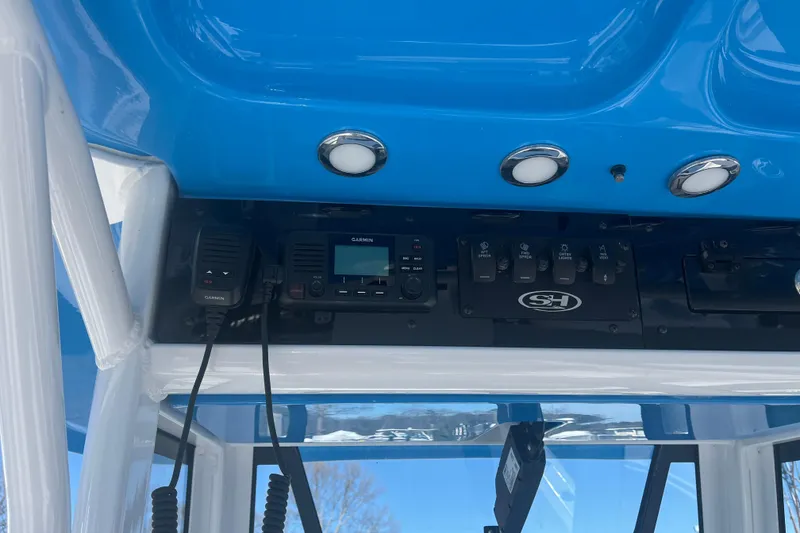 Slide: The Image of Control panel of 2025 Sea Hunt Ultra 265 SE boat with Garmin equipment. - 15