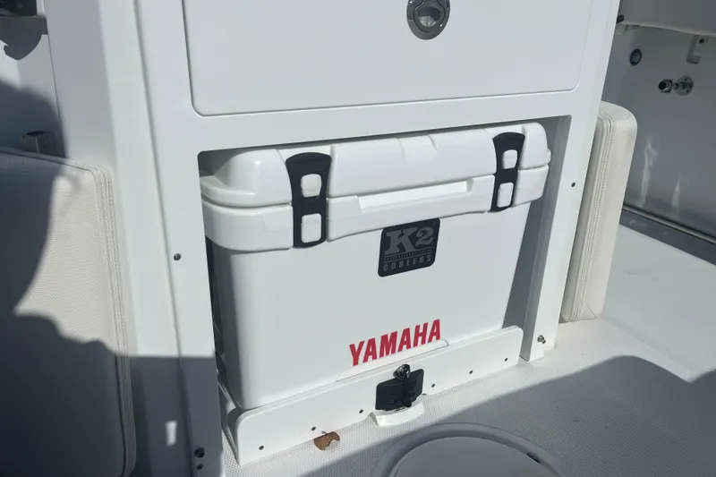 Slide: The Image of Yamaha K2 cooler on 2025 Sea Hunt Ultra 265 SE boat deck. - 9